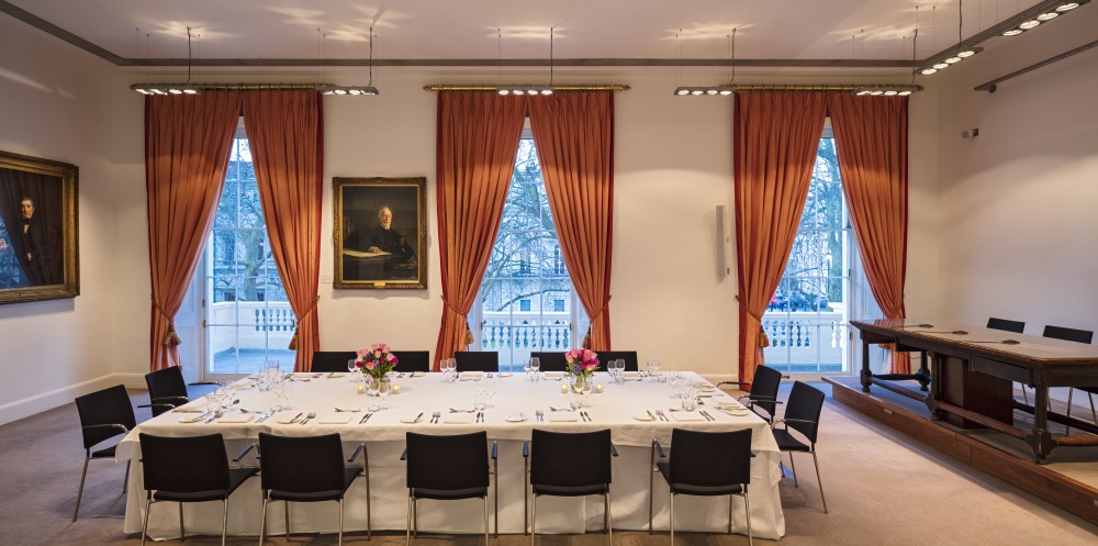 A large white table set for dining.