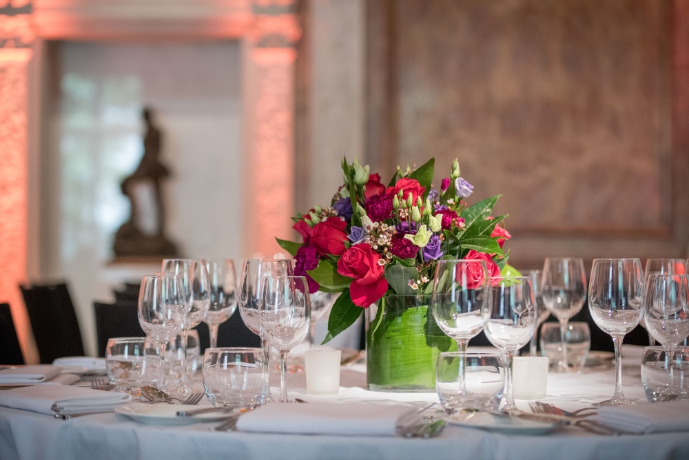 A white table set for dinner.