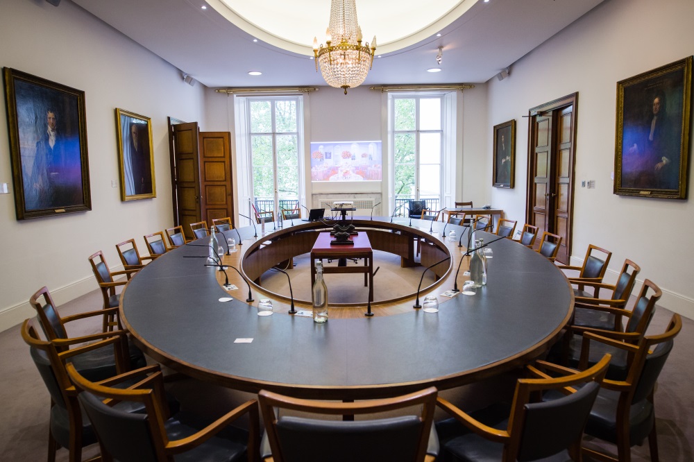 A large hollow oval table.