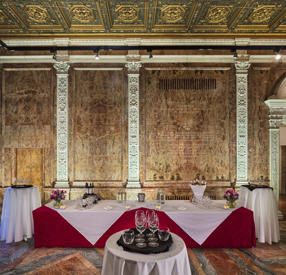 The reception room set for wine and water.