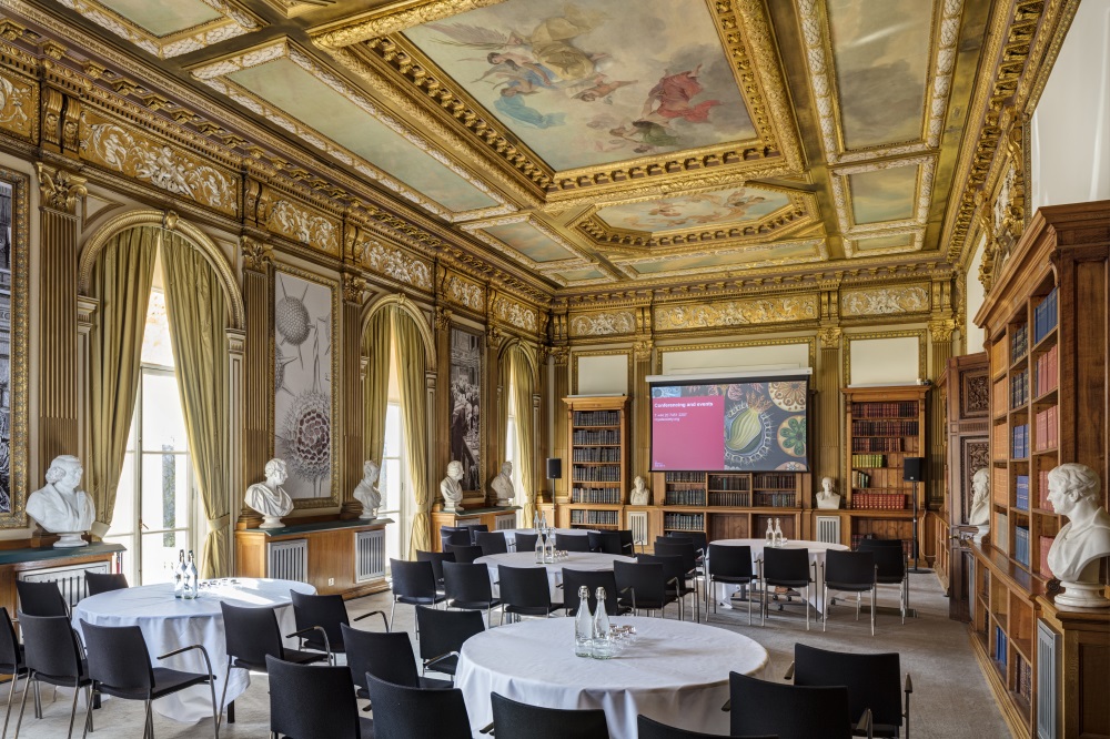 Round tables placed evenly throughout the room.