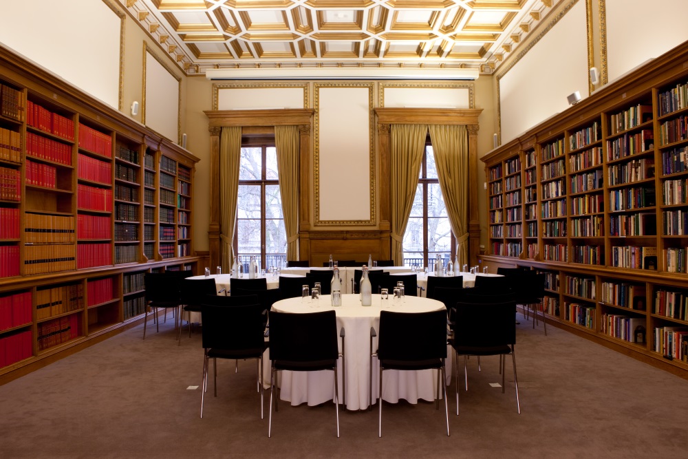 Round tables spread throughout the room.